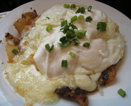 MM PAPAS FRITAS – home fries with red chile, green chile, or tomatillo d’arbol salsa, scallions, melted jack cheese and sour cream with a tortilla 