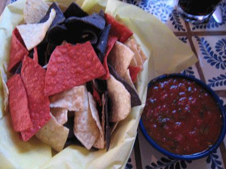 Red, yellow and blue corn tortillas with salsa at Orlando's