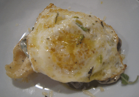 Bruscetta with Mushrooms, Fried Egg, Truffle Oil and Reggianito (an Argentinian cheese)