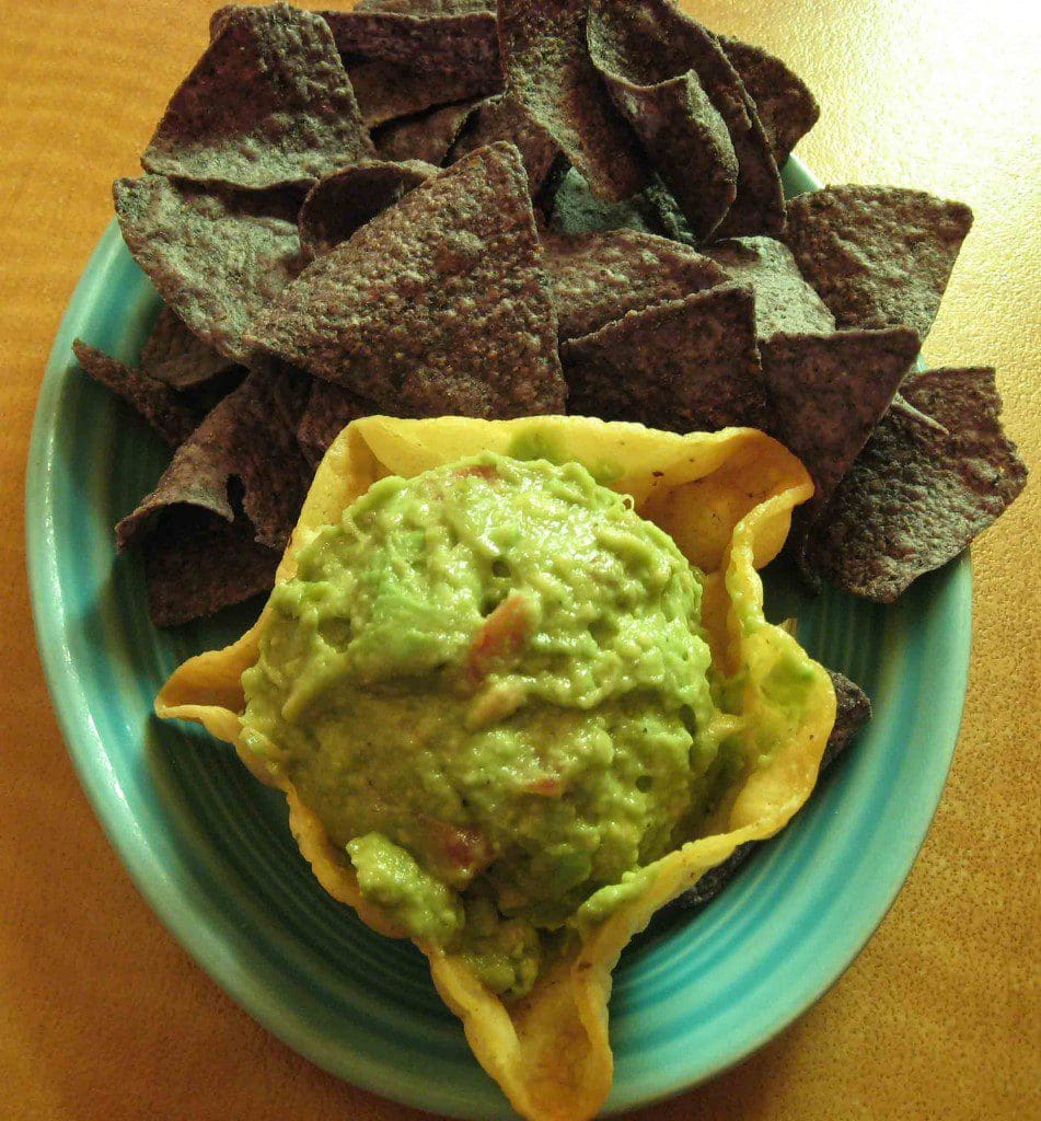 Guacamole and blue corn tortilla chips