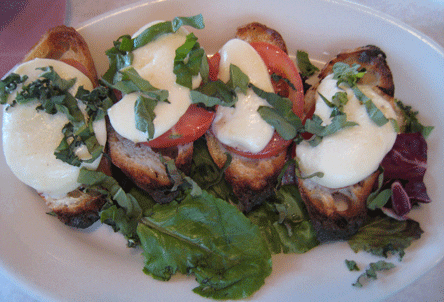 Bruschetta with buffalo mozzarella, tomato and basil