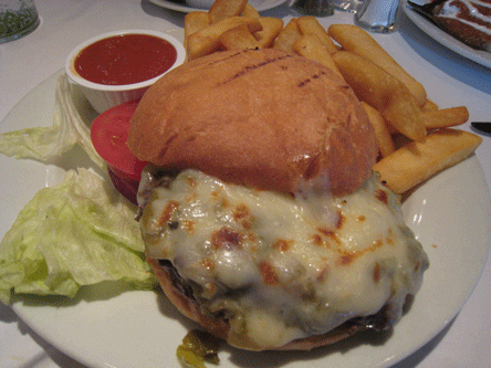 Local organic grass-fed cheeseburger with green chile