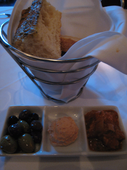 Focaccia Bread with an eggplant tomato relish, hot pepper goat cheese and Kalamata olives