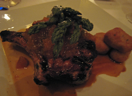 Grilled Niman Ranch Pork Chop, Blood Orange Shallot Marmalatta, Parmigiano Potato Puffs