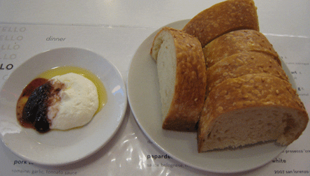 Fresh bread with whipped ricotta, fig jam, olive oil, and sea salt