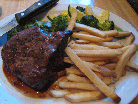 The Flat Iron (a half-pound steak) with French Fries and Vegetables
