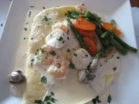 Seafood Crepe Large sea scallops, shrimp and mushrooms in rich lobster cream sauce
