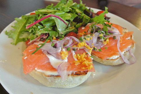 Smoked Salmon: cream cheese, red onion, capers, lemon, creme fraiche, chives with green side salad served on housemade English muffin