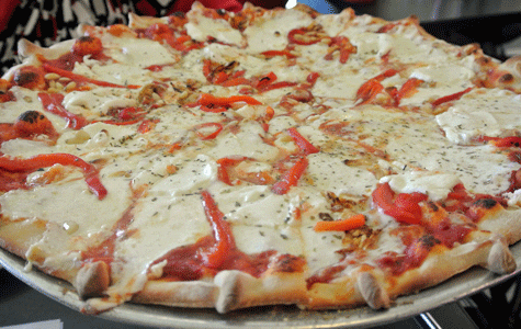 A Large "Giovanni" Pizza: Montrachet Goat Cheese, Roasted Red Peppers, Roasted Garlic Cloves and Fresh Oregano
