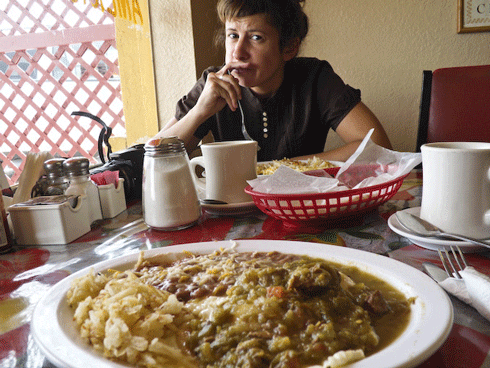 Andrea enjoying huevos rancheros