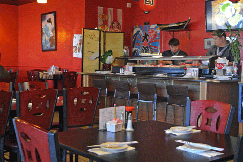 Carter prepares sushi for eager customers